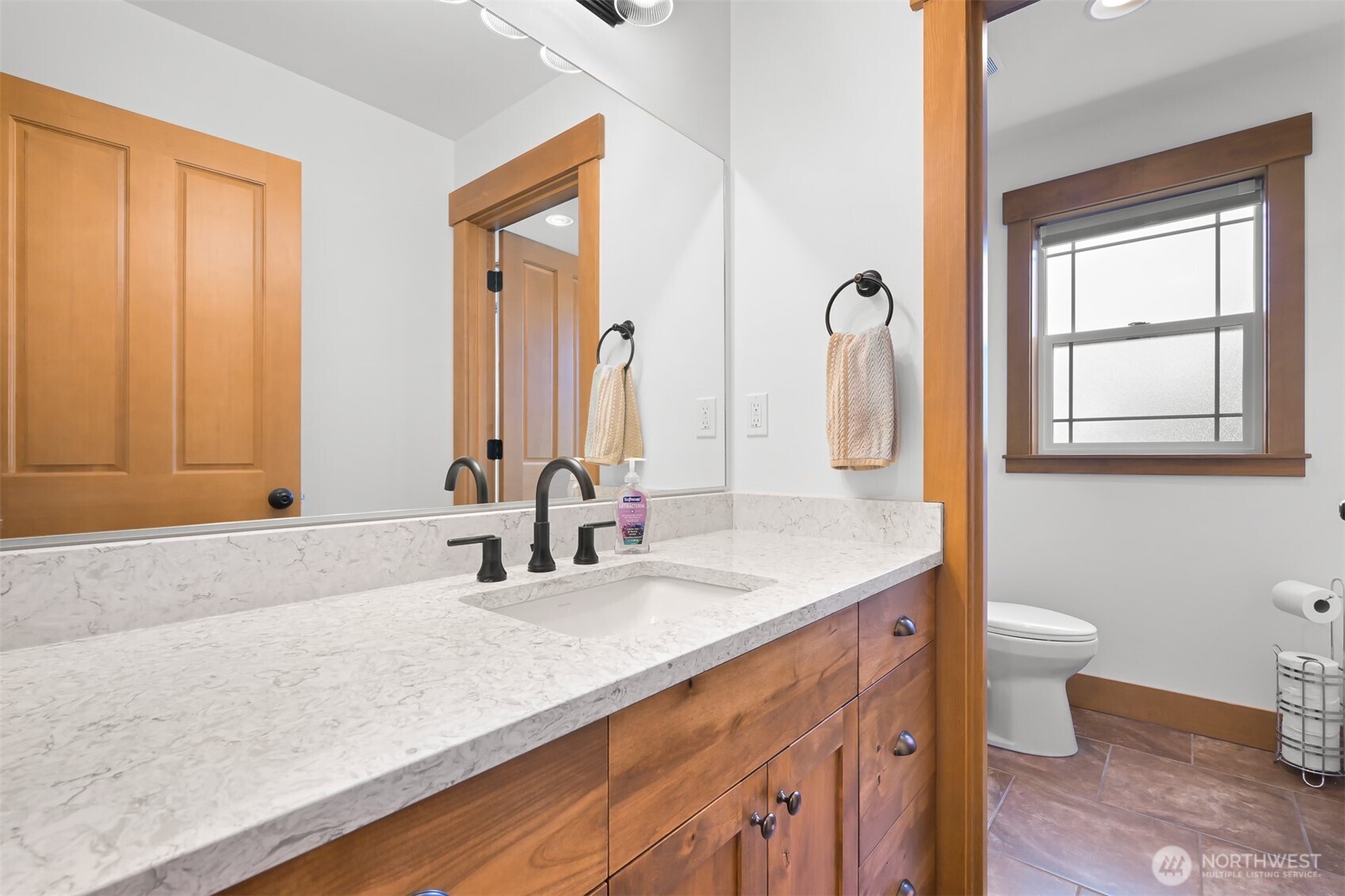 502 Westview Place Nooksack, WA 98276 - Photo 17 of 30 a bathroom with a granite countertop sink and a mirror