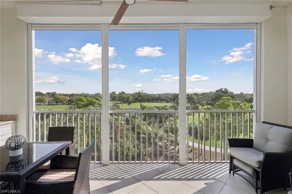 a balcony with furniture