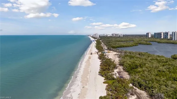 a view of a lake with a city