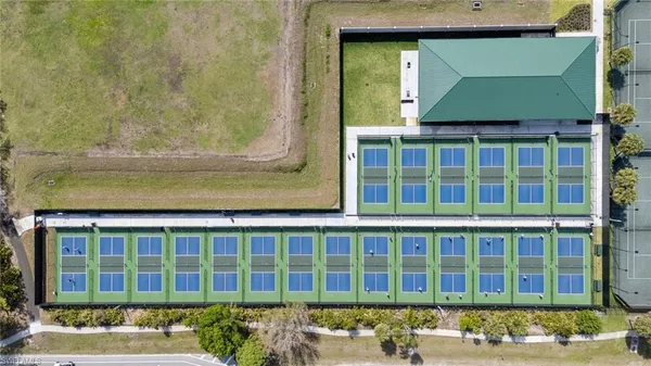 a view of a room with lot of gym equipment