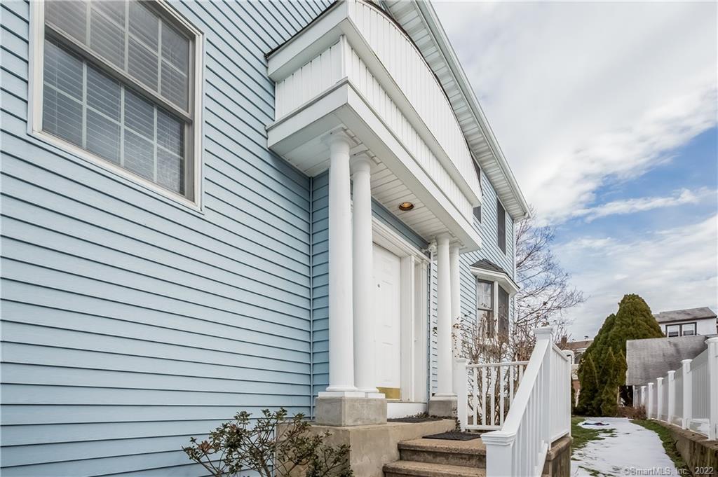 45 Alexander Street, Unit B Greenwich, CT 06830 - Photo 1 of 1 a view of a building with many windows