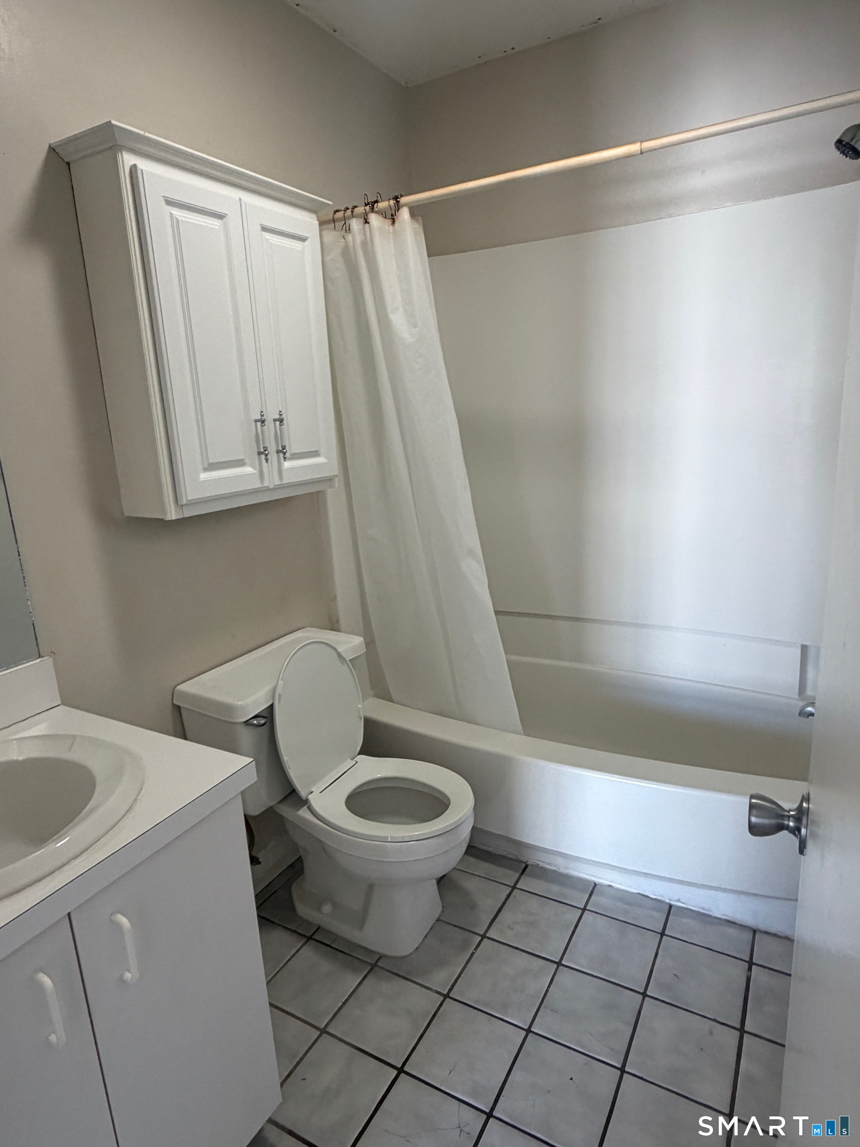 925 Oronoke Road, Unit 30F Waterbury, CT 06708 - Photo 11 of 12 a bathroom with a sink and a vanity