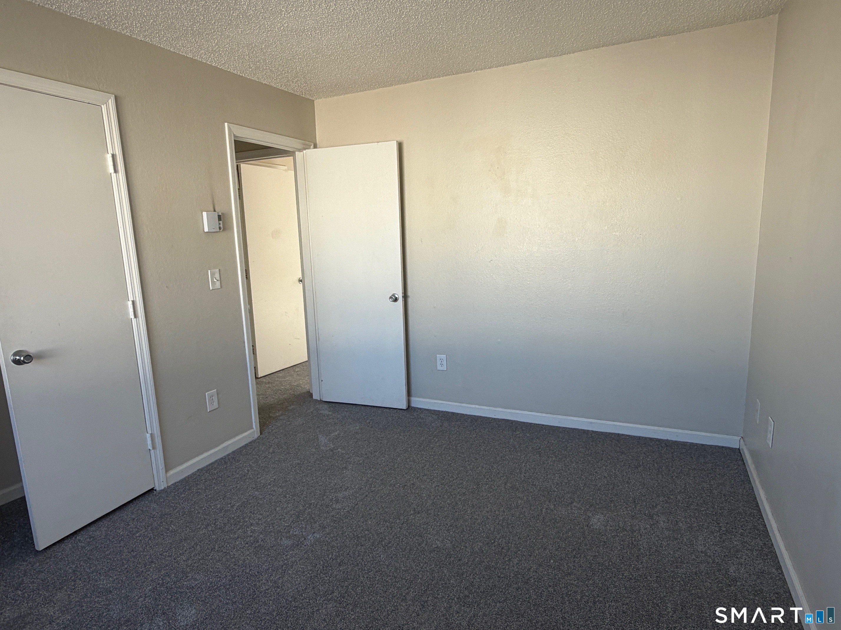 925 Oronoke Road, Unit 30F Waterbury, CT 06708 - Photo 10 of 12 an empty room with a bathroom