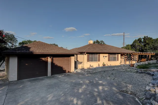 a house view with a garden space