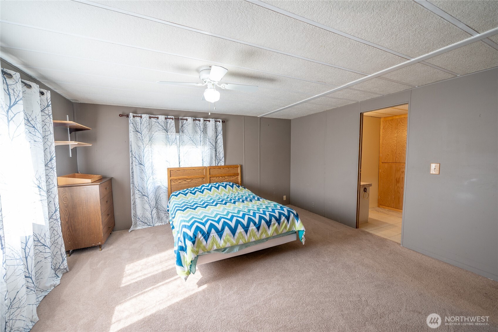 57 Clemons Road, Unit 68 Montesano, WA 98563 - Photo 15 of 27 a bedroom with a bed and a window