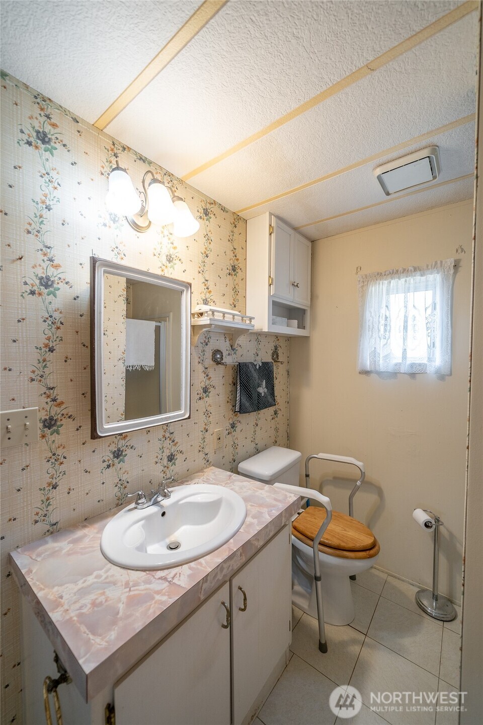 57 Clemons Road, Unit 68 Montesano, WA 98563 - Photo 18 of 27 a bathroom with a sink and a toilet