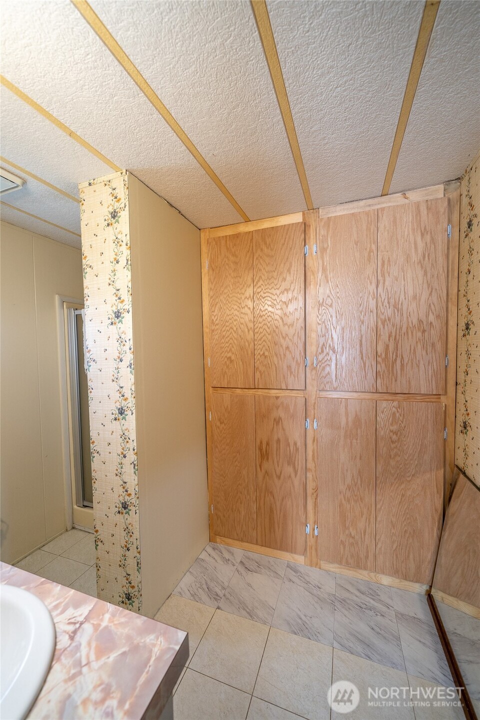 57 Clemons Road, Unit 68 Montesano, WA 98563 - Photo 19 of 27 a bathroom with a shower and a sink