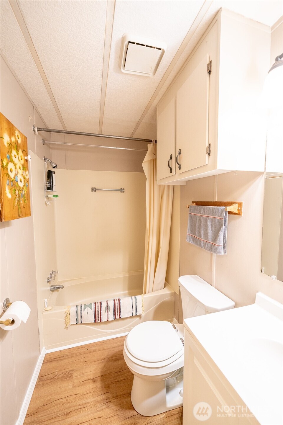 57 Clemons Road, Unit 68 Montesano, WA 98563 - Photo 23 of 27 a bathroom with a sink a toilet and shower