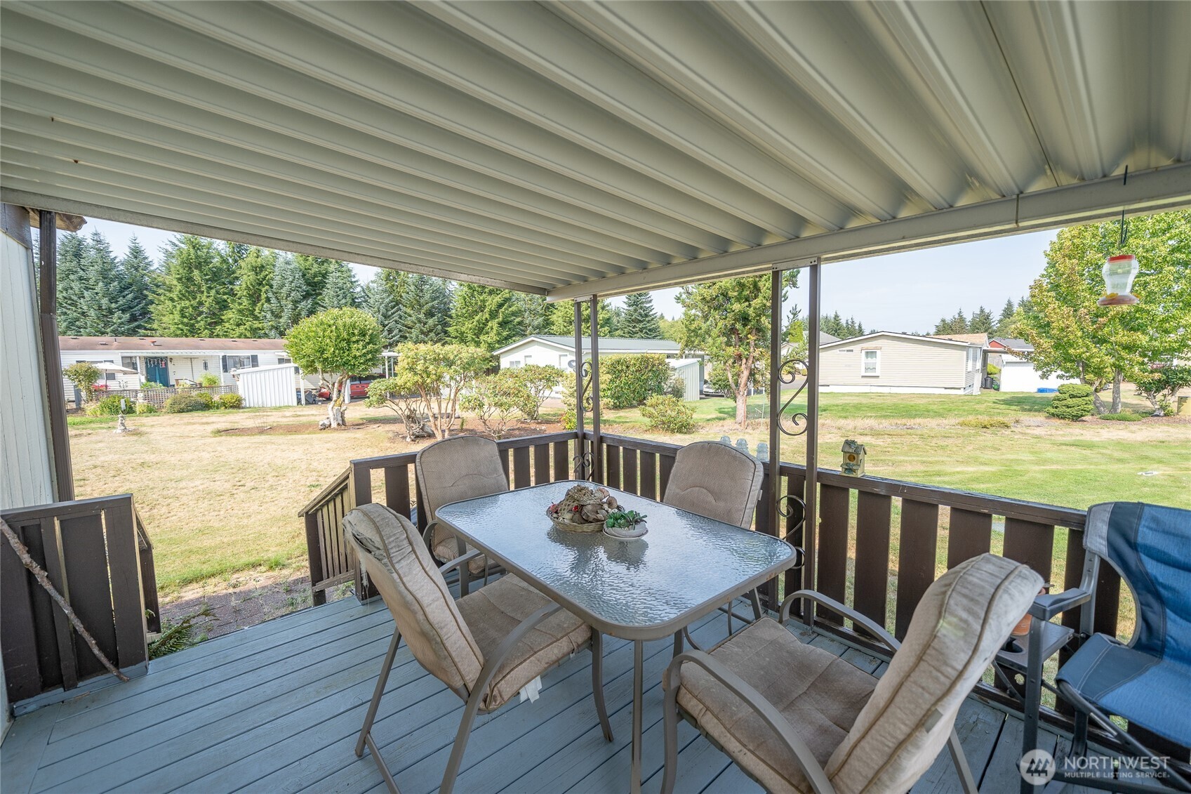 57 Clemons Road, Unit 68 Montesano, WA 98563 - Photo 26 of 27 a view of a dining room with furniture window and outside view