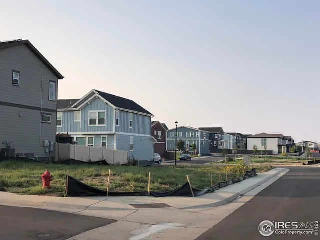 a view of a house with a big yard