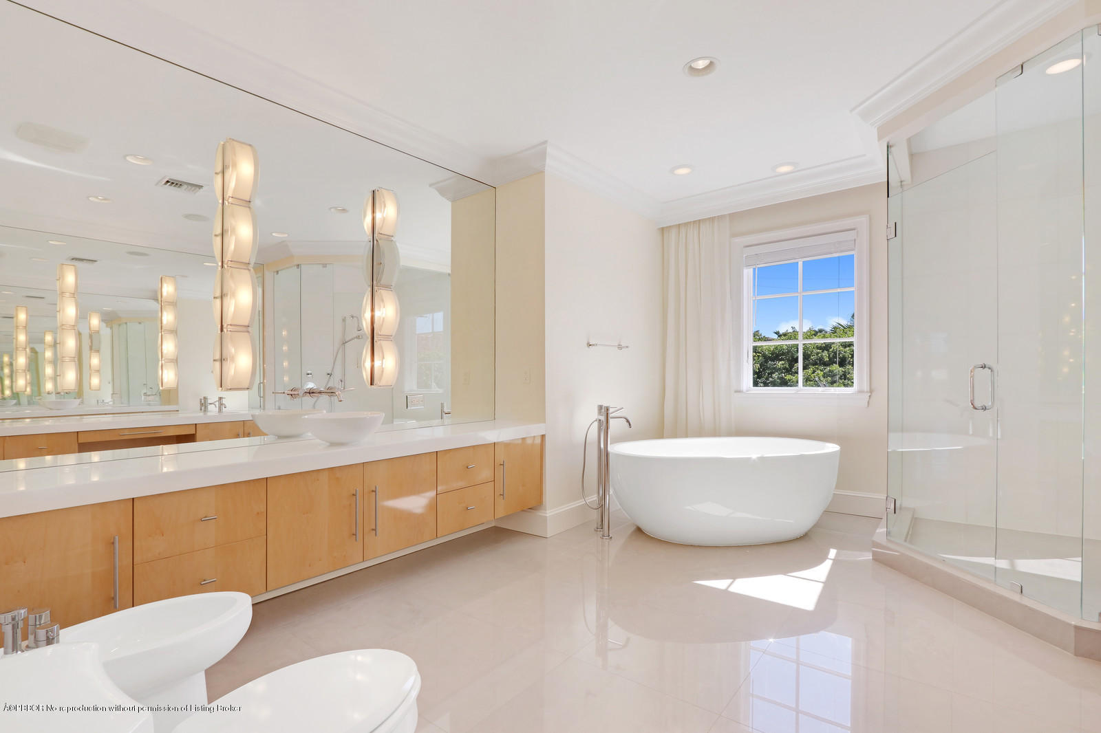 695 South County Road Palm Beach, FL 33480 - Photo 11 of 17 a bathroom with a granite countertop sink and a large mirror