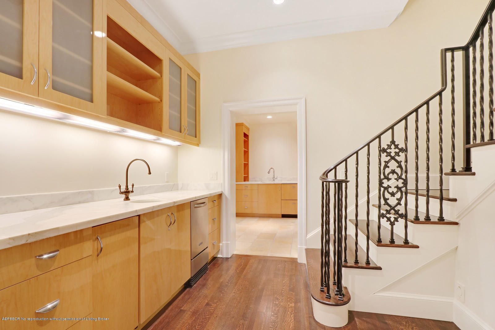 695 South County Road Palm Beach, FL 33480 - Photo 7 of 17 a view of a kitchen with wooden floor and staircase