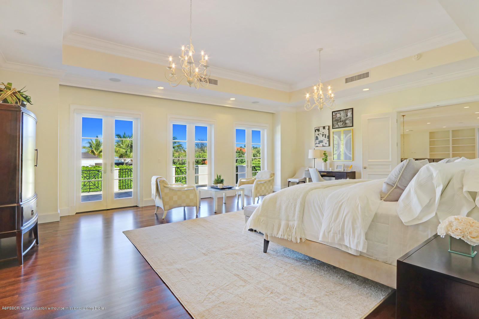 695 South County Road Palm Beach, FL 33480 - Photo 8 of 17 a spacious bedroom with a large bed and a large window