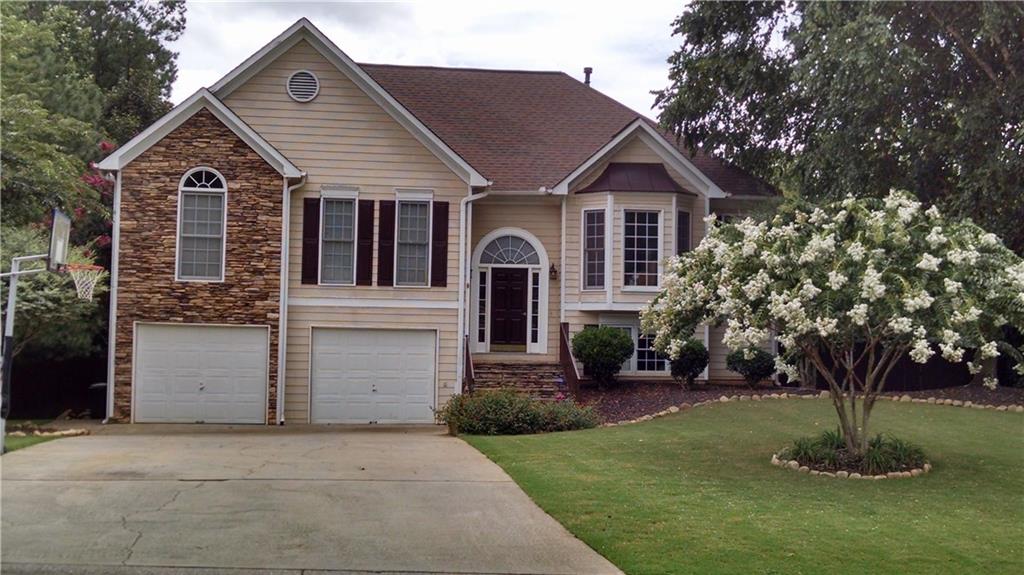 371 Valor Ridge Drive Dallas, GA 30132 - Photo 1 of 1 Beautiful 4 Bed/2 Bath Home With Stone Accents In Johnston's Ridge
