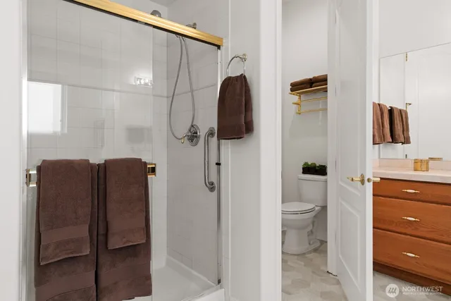 a bathroom with a toilet and a sink