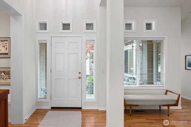 a view of a livingroom with furniture and windows