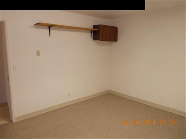 594 Naalae Road Kula, HI 96790 - Photo 11 of 14 a view of a room with wooden floor