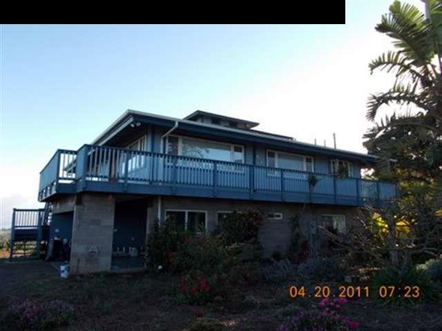 594 Naalae Road Kula, HI 96790 - Photo 3 of 14 a view of a house with wooden fence