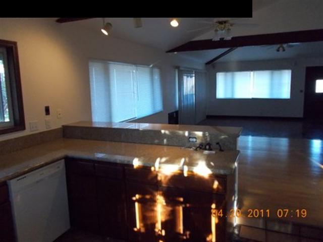 594 Naalae Road Kula, HI 96790 - Photo 8 of 14 a view of a livingroom with a fireplace