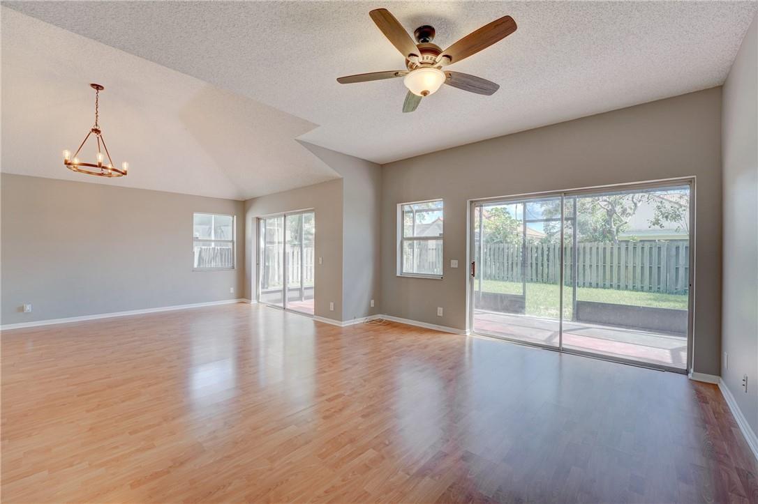 Undisclosed Address Davie, FL 33328 - Photo 12 of 24 a view of an empty room with wooden floor and a window