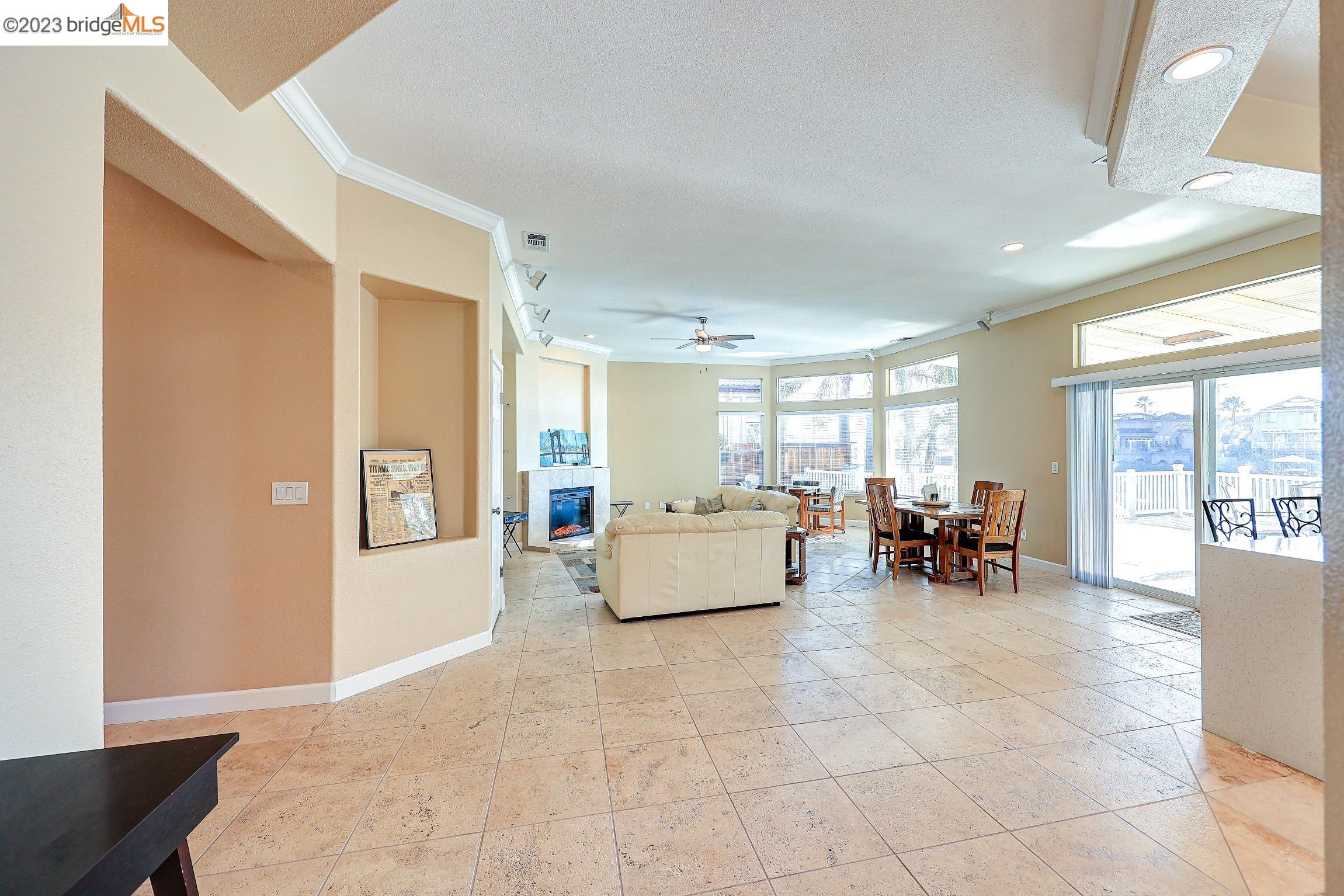 4050 Pier Point, Unit 100 Discovery Bay, CA 94505 - Photo 11 of 60 a living room with furniture and next to a window