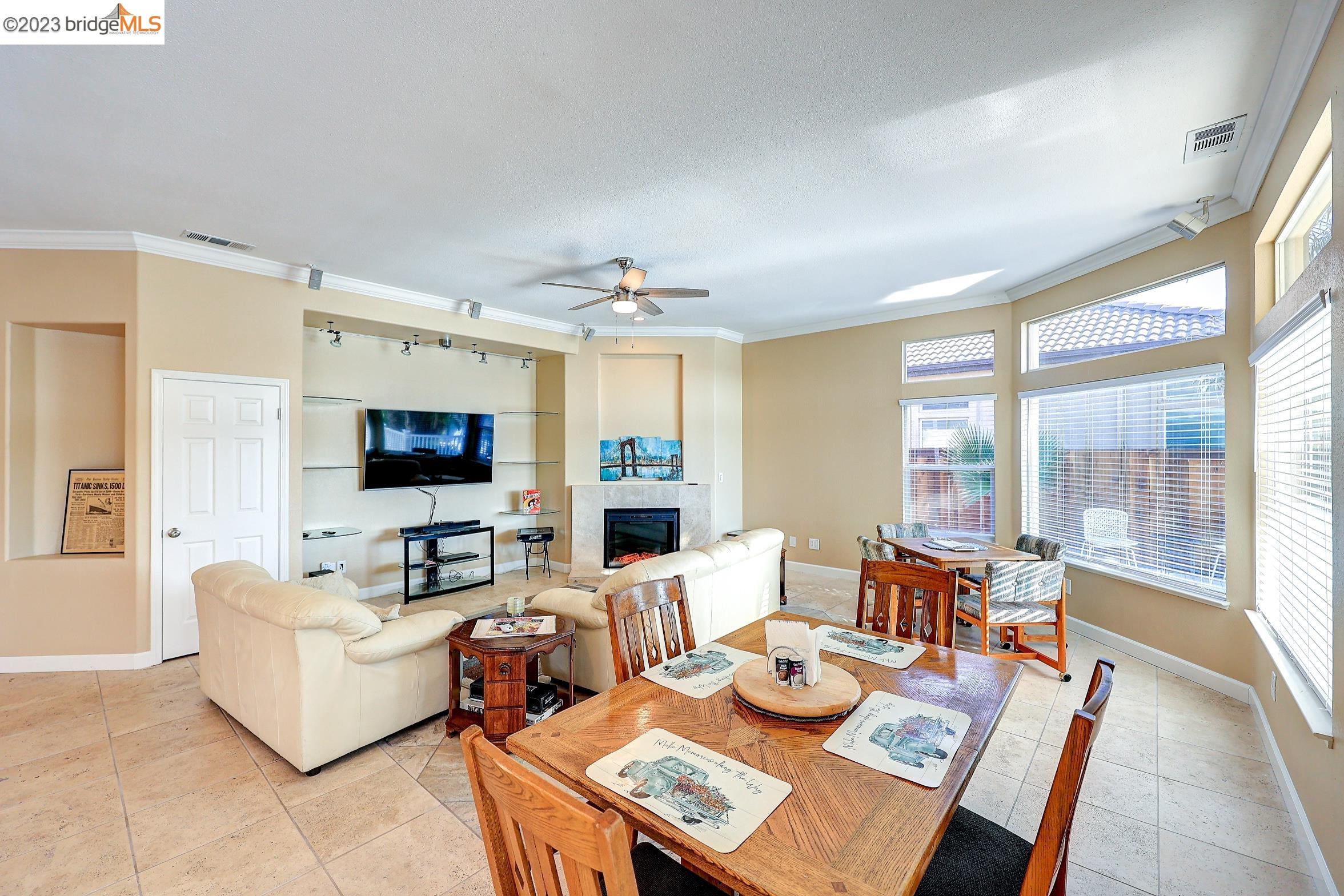 4050 Pier Point, Unit 100 Discovery Bay, CA 94505 - Photo 19 of 60 a living room with furniture and a flat screen tv