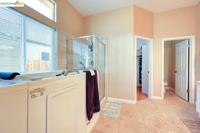 a bathroom with a sink vanity and a mirror