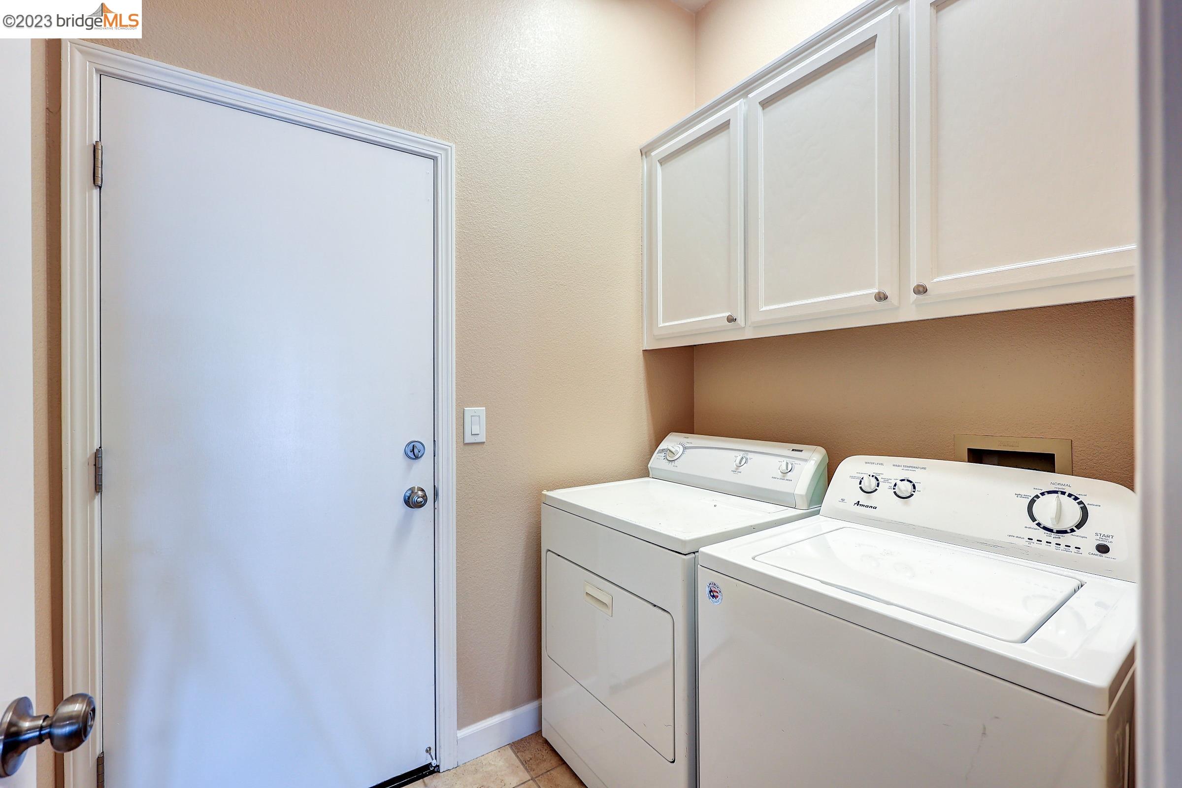 4050 Pier Point, Unit 100 Discovery Bay, CA 94505 - Photo 38 of 60 a utility room with dryer and washer