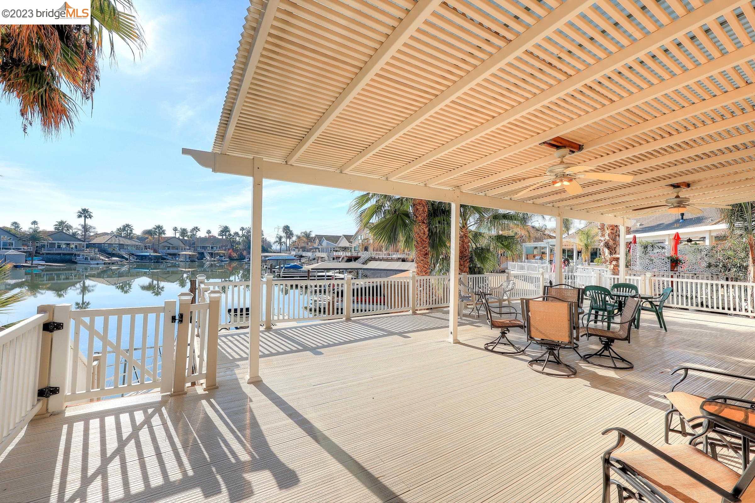 4050 Pier Point, Unit 100 Discovery Bay, CA 94505 - Photo 41 of 60 a view of a swimming pool with a table and chairs