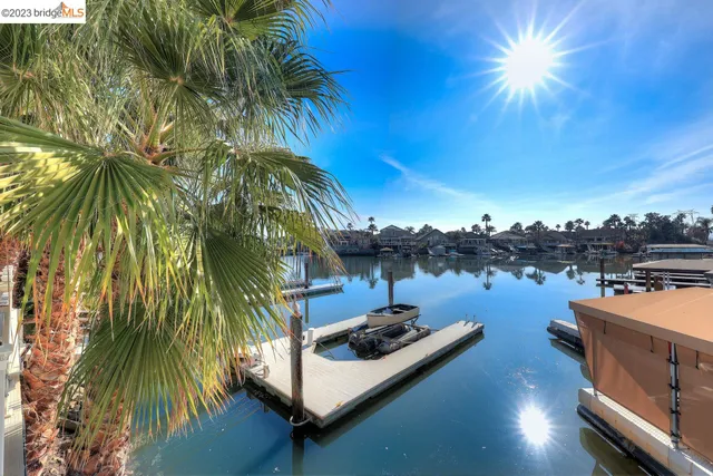 a view of house with outdoor space and seating