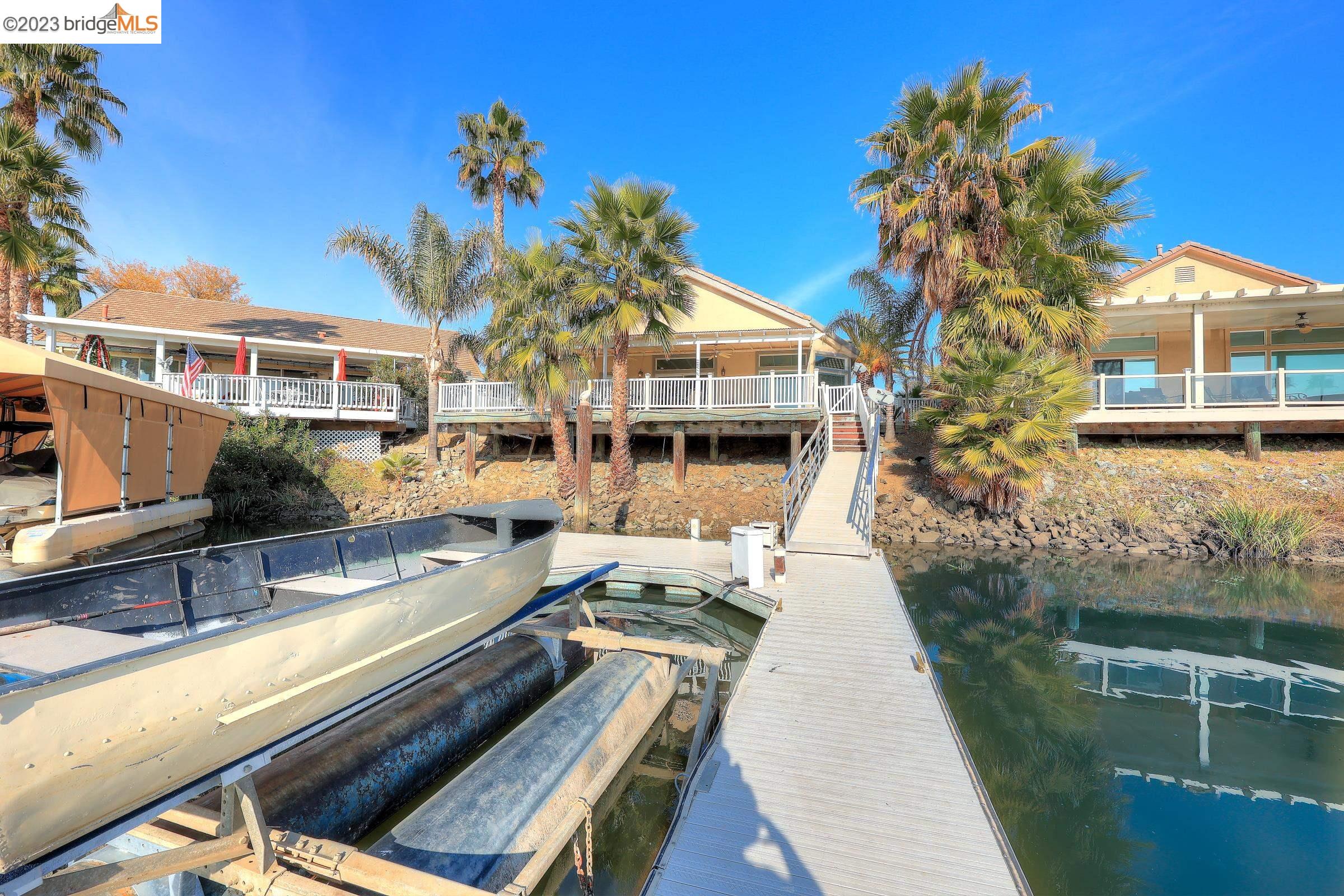4050 Pier Point, Unit 100 Discovery Bay, CA 94505 - Photo 48 of 60 a front view of a house with swimming pool