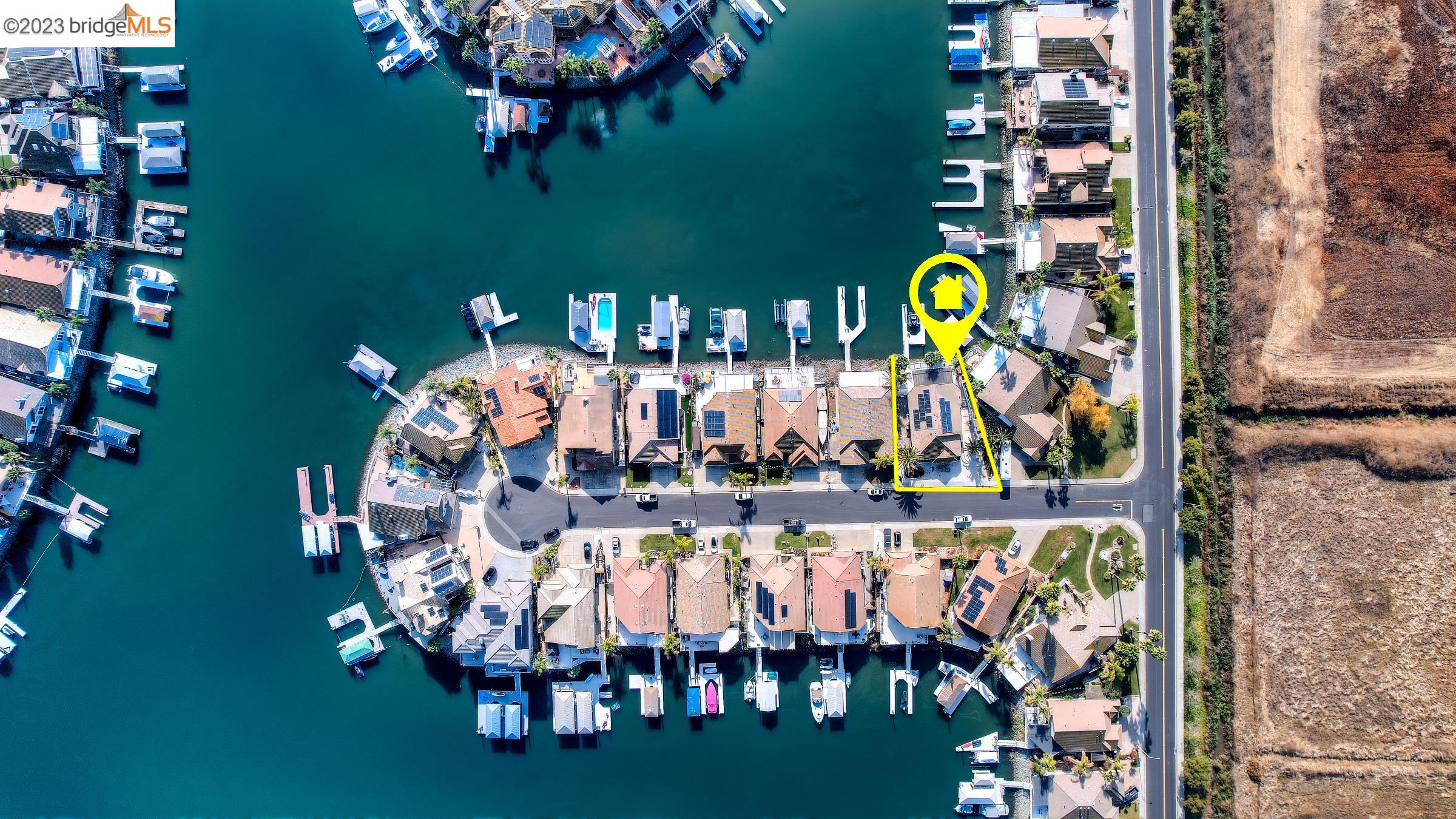 4050 Pier Point, Unit 100 Discovery Bay, CA 94505 - Photo 59 of 60 a view of a chairs and table in a backyard