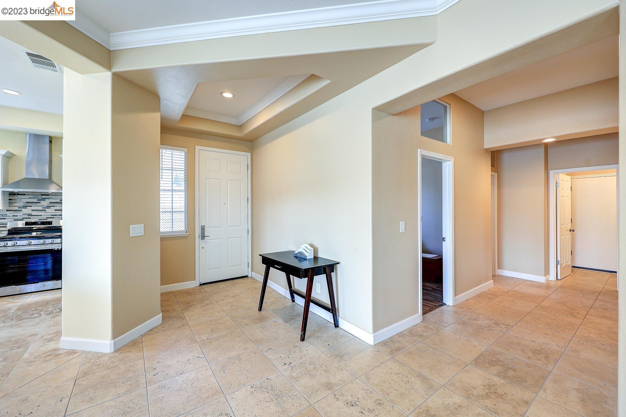 4050 Pier Point, Unit 100 Discovery Bay, CA 94505 - Photo 10 of 60 a view of a hallway with a livingroom and a bathroom