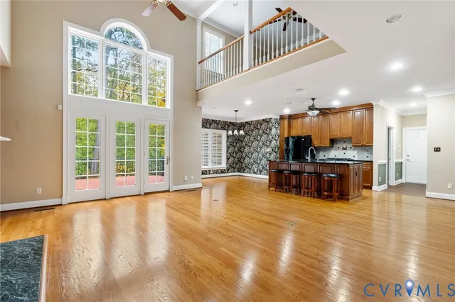 a view of kitchen with furniture and large windows
