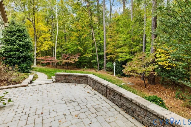 a view of a pathway with a yard