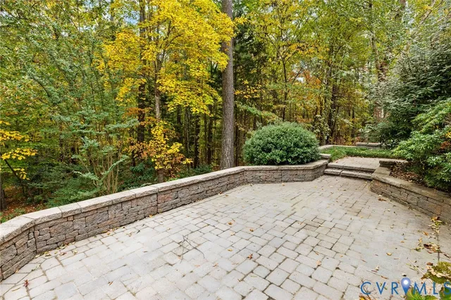 a view of a backyard of the house