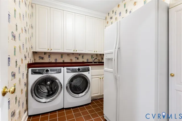 a view of a hallway with washer and dryer