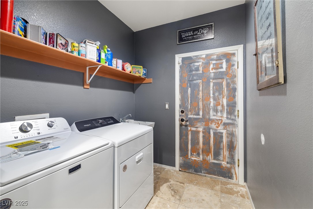 1131 South Blagg Road Pahrump, NV 89048 - Photo 24 of 30 Laundry area featuring washing machine and dryer and laundry area
