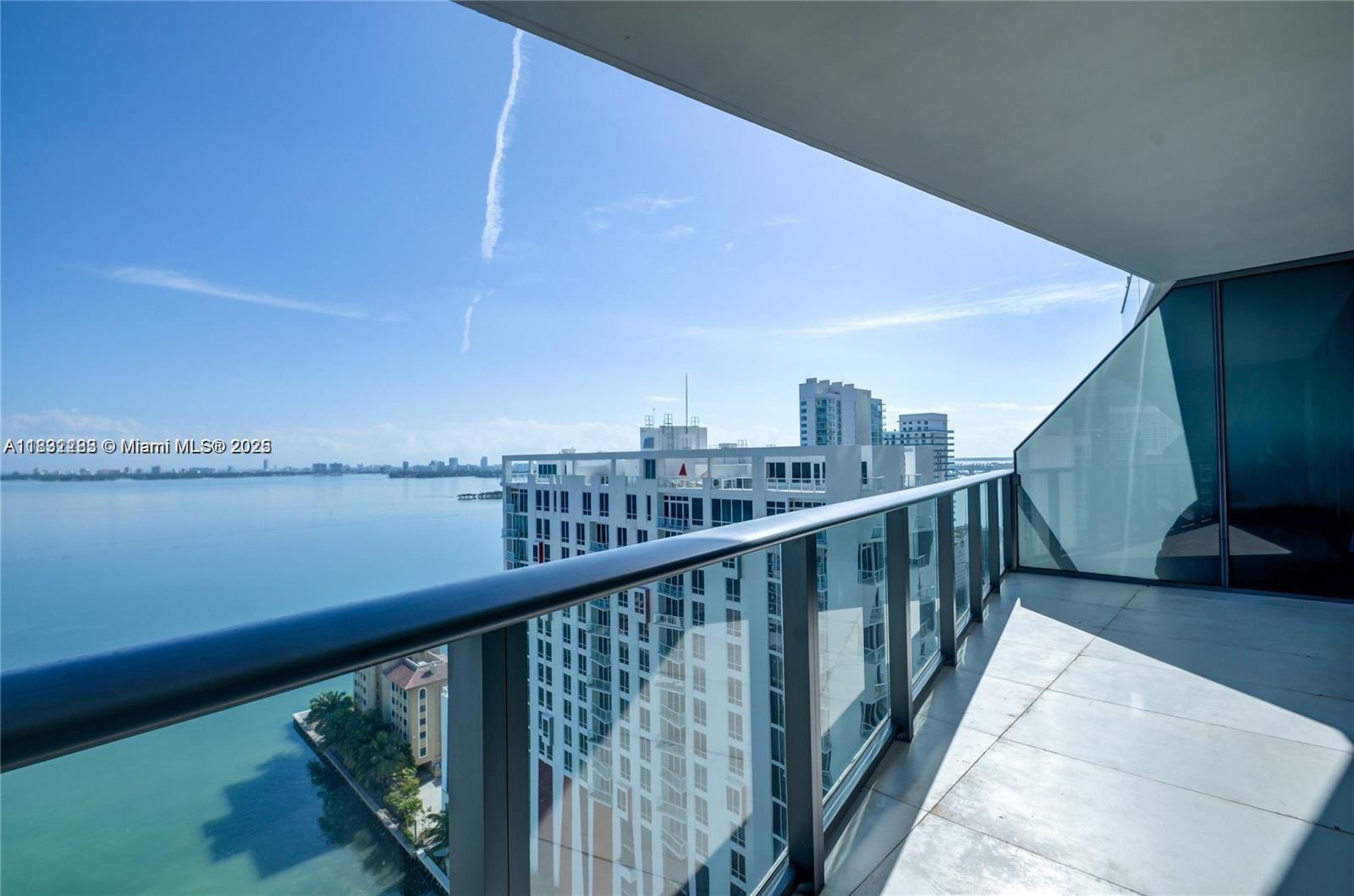 460 Northeast 28th Street, Unit 2106 Miami, FL 33137 - Photo 1 of 3 a view of a balcony with an ocean view