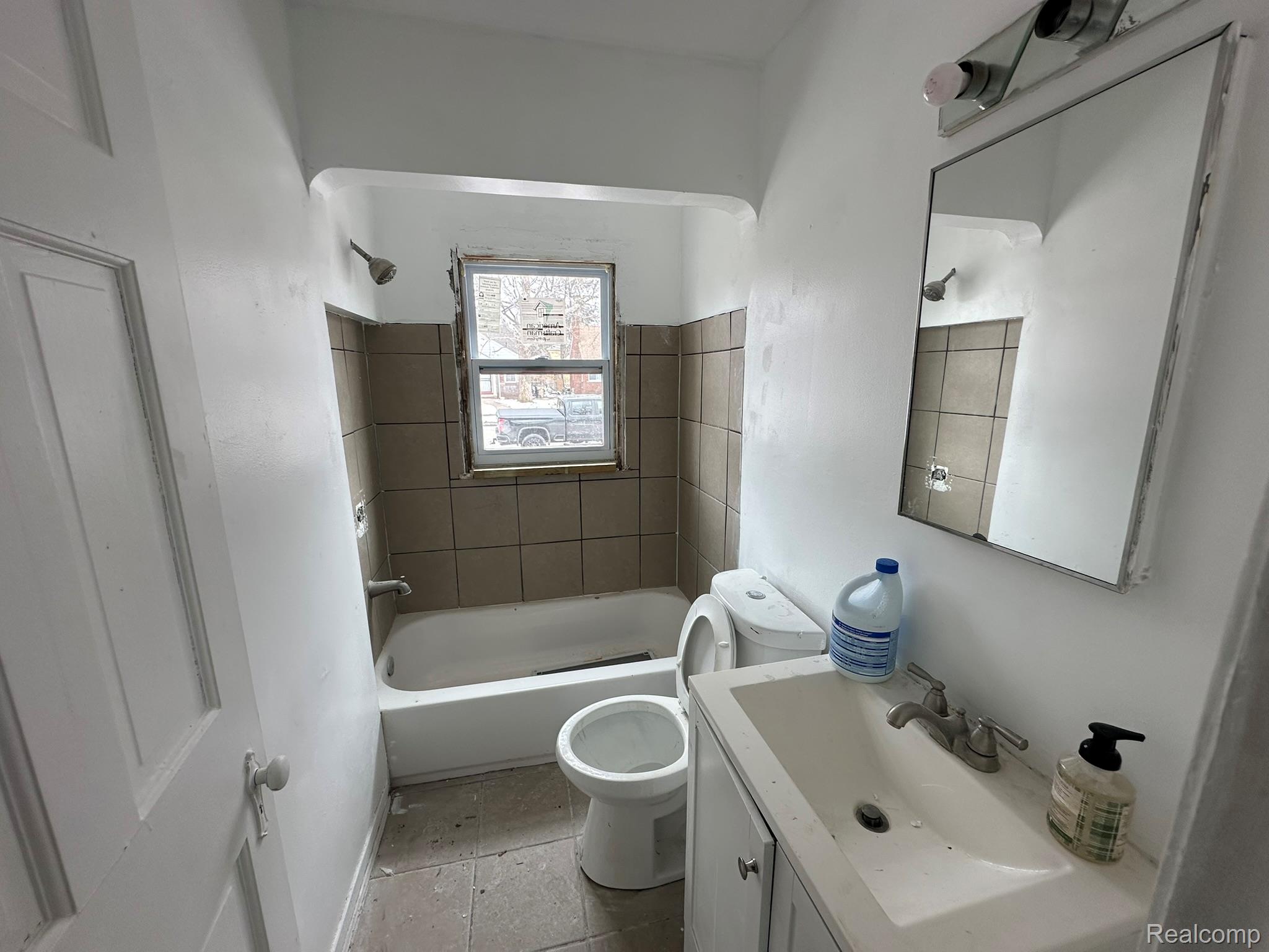 15759 Evergreen Road Detroit, MI 48223 - Photo 7 of 25 Bathroom featuring vanity and shower / bath combination