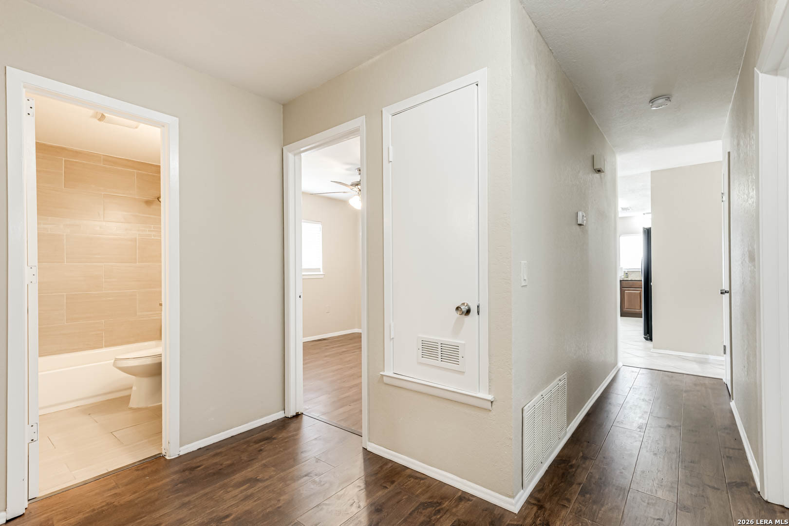 112 Friendswood Path Universal City, TX 78148 - Photo 15 of 31 a view of a hallway with wooden floor