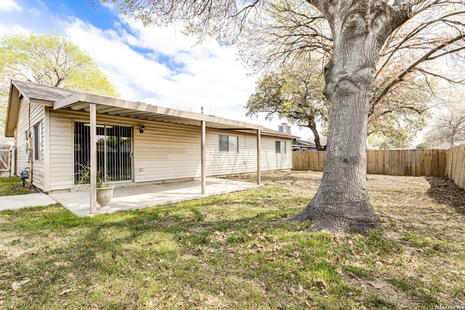 112 Friendswood Path Universal City, TX 78148 - Photo 31 of 31 front view of a house with a yard and an trees