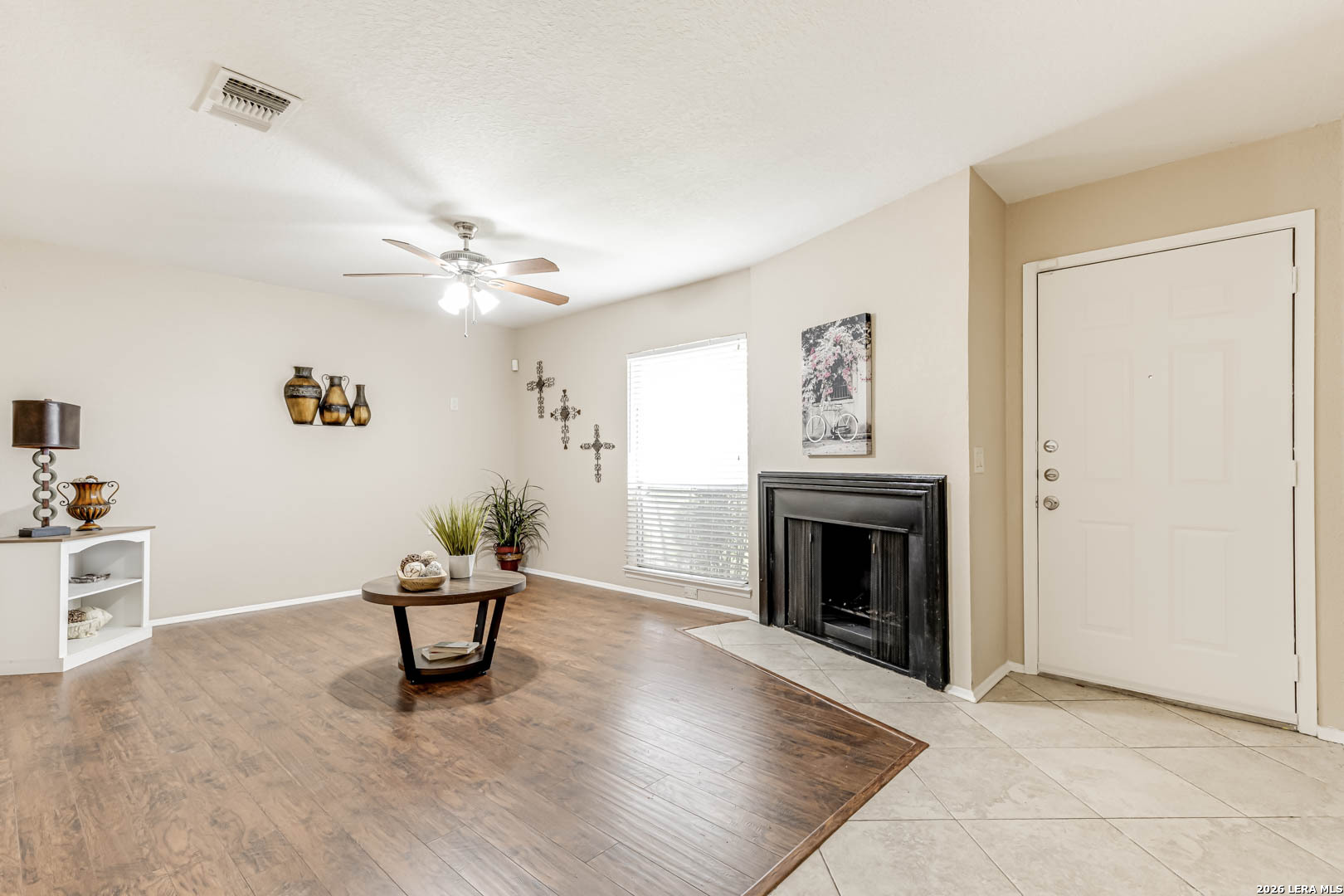 112 Friendswood Path Universal City, TX 78148 - Photo 4 of 31 a living room with furniture and a fireplace