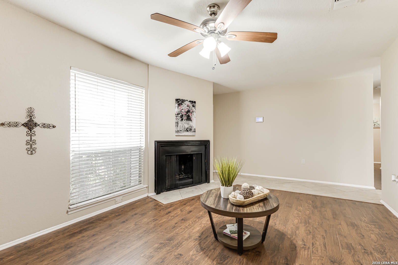 112 Friendswood Path Universal City, TX 78148 - Photo 5 of 31 a living room with furniture and a fireplace