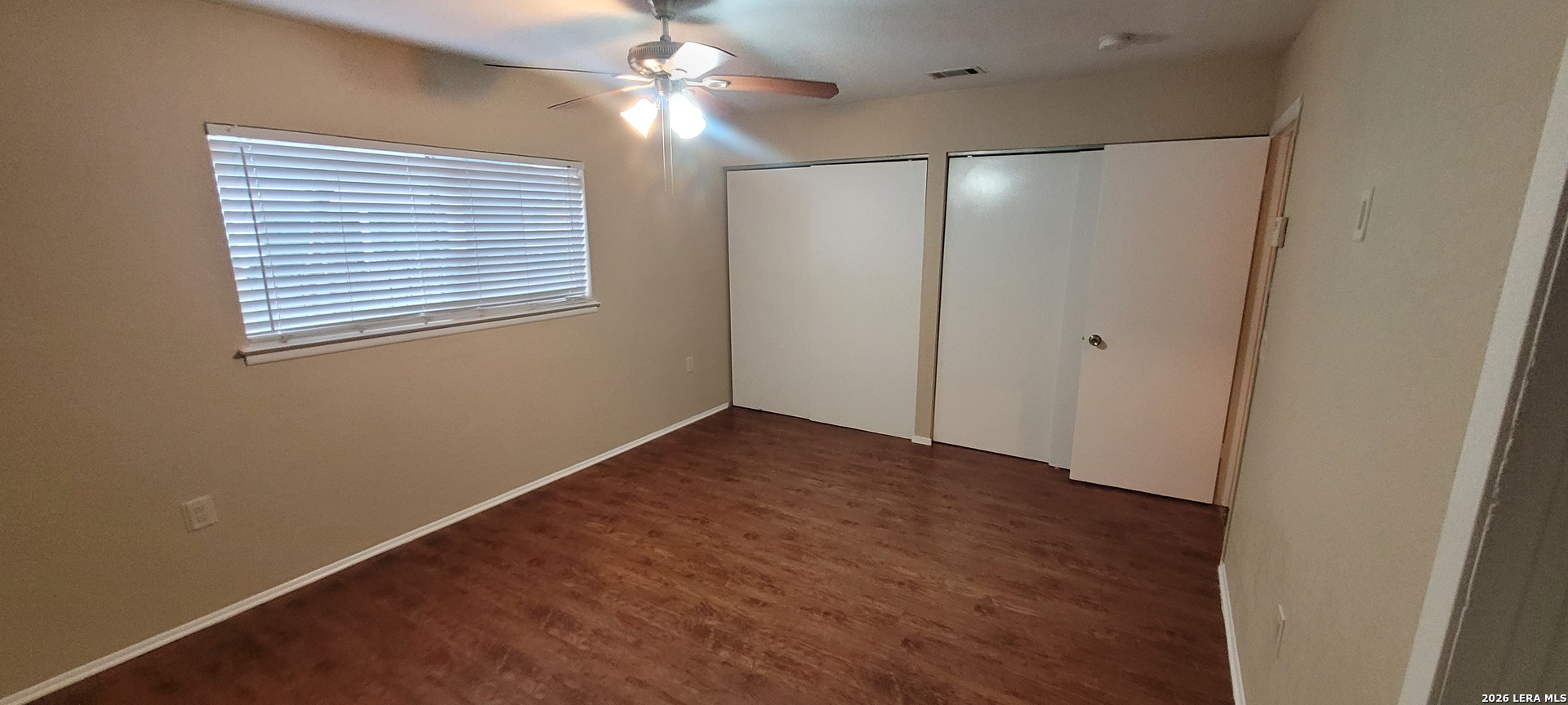 112 Friendswood Path Universal City, TX 78148 - Photo 7 of 8 a view of an empty room with a window