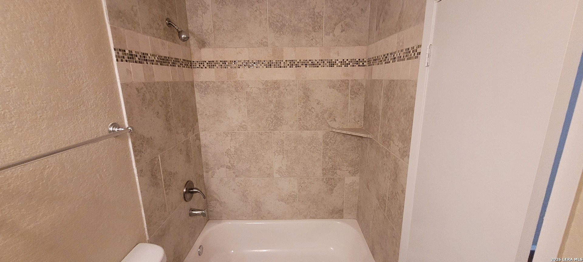 112 Friendswood Path Universal City, TX 78148 - Photo 8 of 8 a bathroom with a shower and a toilet