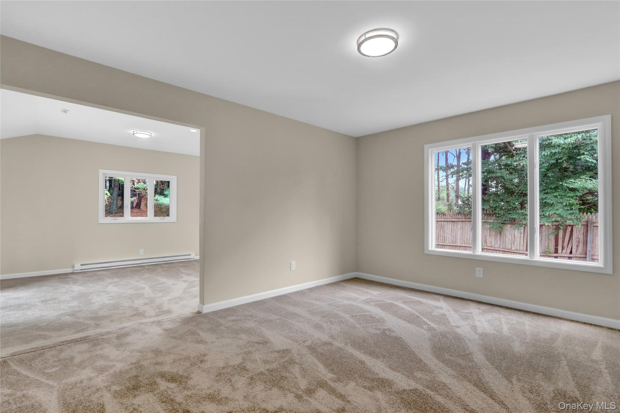 181 Wading River Hollow Road Ridge, NY 11961 - Photo 16 of 24 an empty room with a window