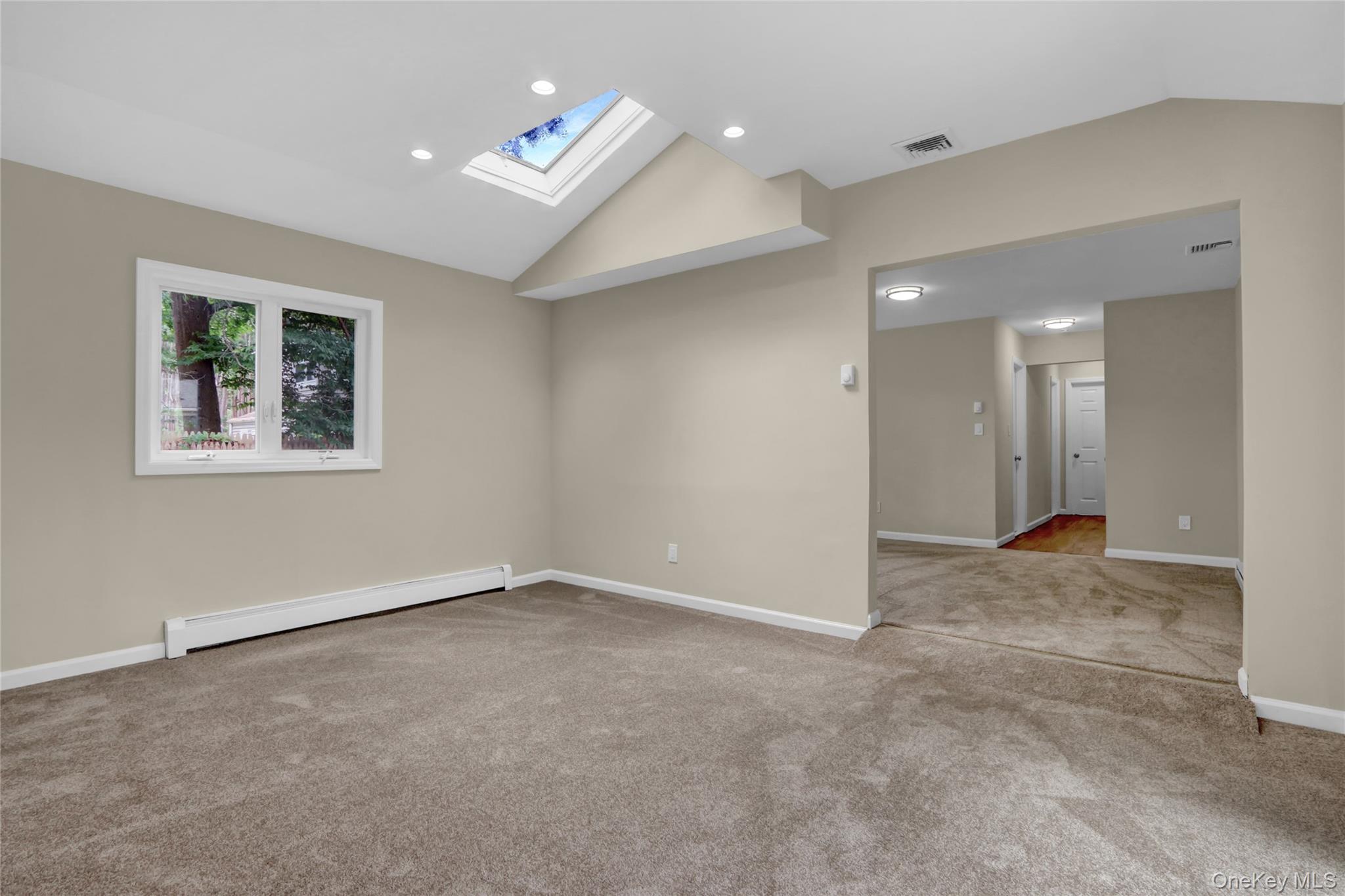 181 Wading River Hollow Road Ridge, NY 11961 - Photo 19 of 24 a view of an empty room with a window
