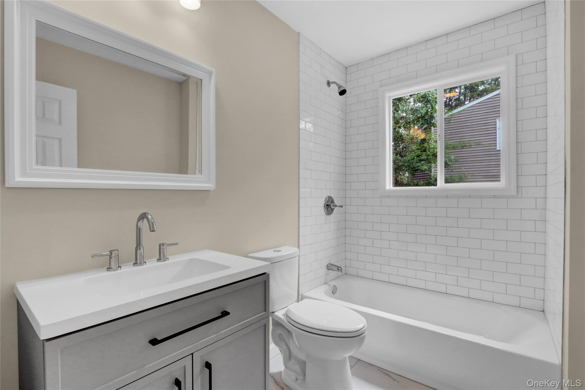 181 Wading River Hollow Road Ridge, NY 11961 - Photo 20 of 24 a bathroom with a sink toilet a mirror and shower