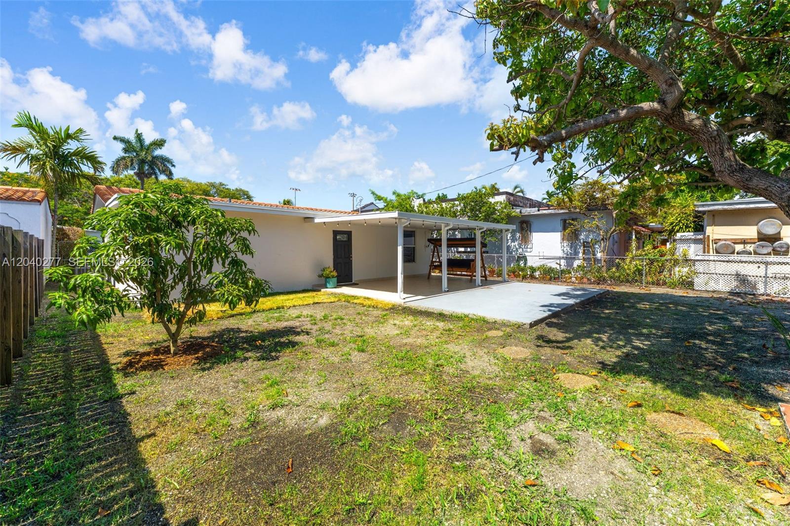2131 Southwest 17th Street Miami, FL 33145 - Photo 24 of 28 Covered patio + mango tree